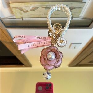 Elegant Pink and Gold Keychain with Pearl Accents